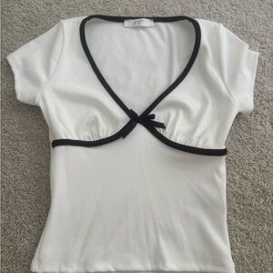 White Top with Black Bow Trim